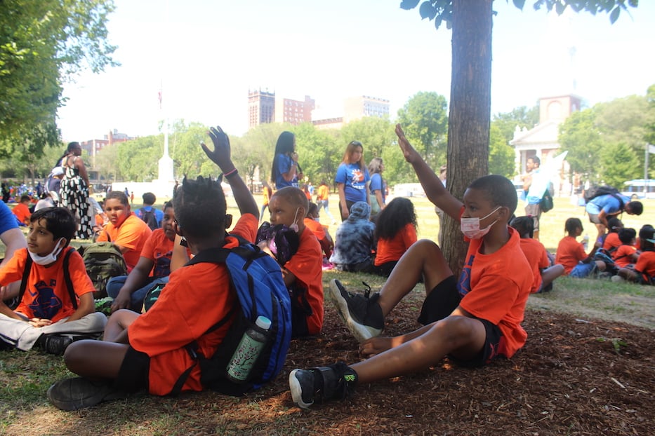 The boys from Quinnipiac Meadows listen to Maria Bernhey read Jabari Jumps