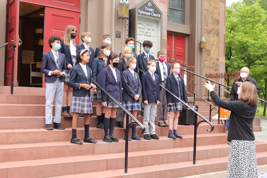 The St. Thomas sixth graders sing _Lift Every Voice,_ the Black National Anthem