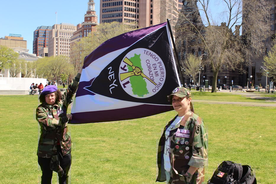 Posing with the multi-colored New Era Young Lords (NEYL)