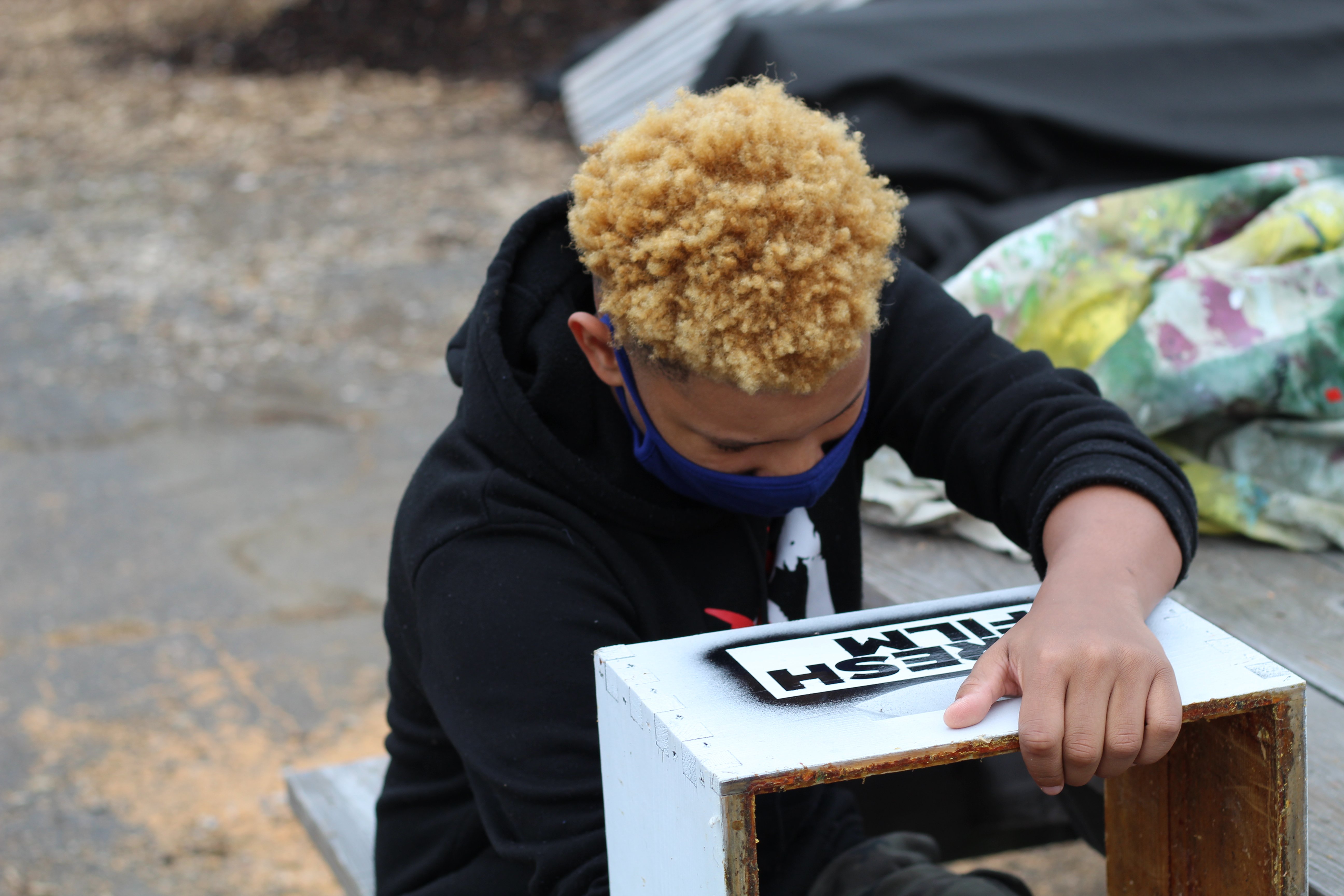 Nazir Grayson preparing one of the box for a sponsorship