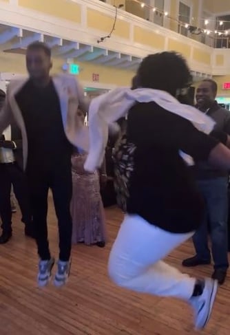 Azhar and Abdulfatah jump-dancing on New Years Eve, screenshot of a video by Suzy Mabior