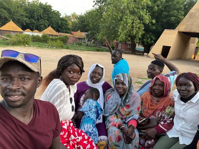 Fouad Dagoum with his wife Azhar Ahmed, their children Kutti and Lameese, and other family in Sudan. Summer 2022