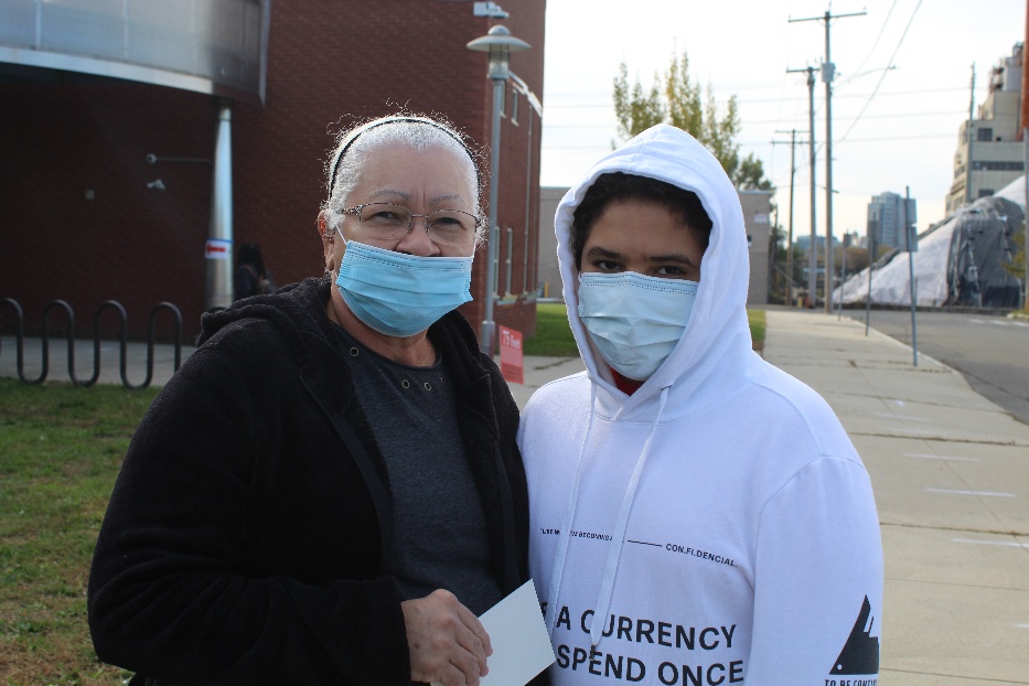 Margarita Rodriguez with her grandson Johan Rodriguez outside of John Martinez school