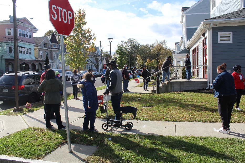 The line of voters gathered outside of the Chatam Community Room around noon