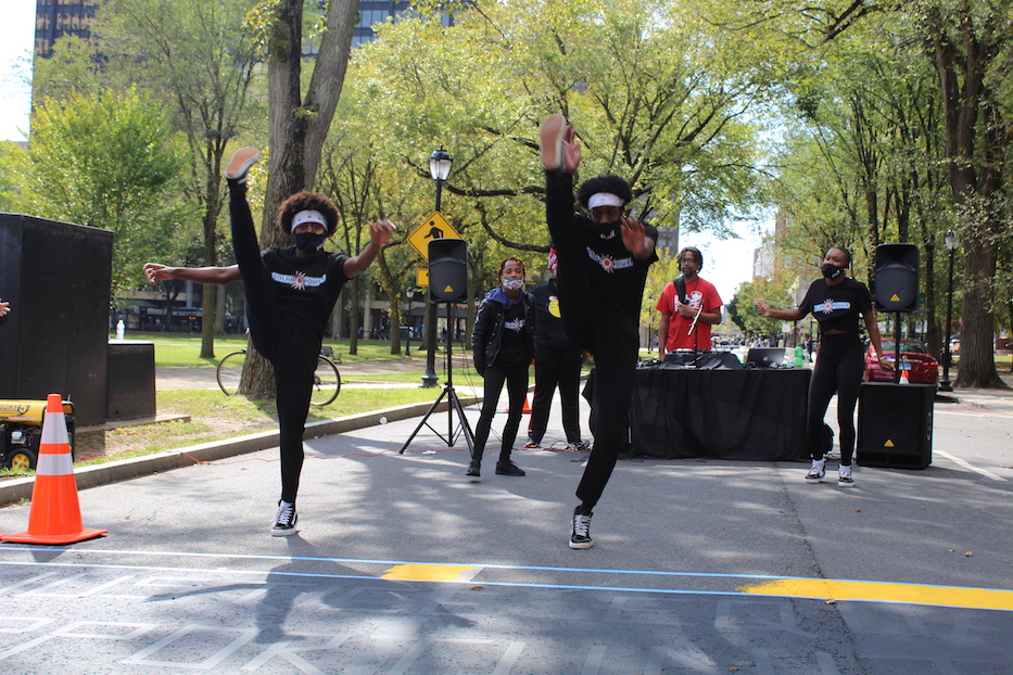 Tyler Jackson and Gabriel Francias from Solar Power performing high kicks