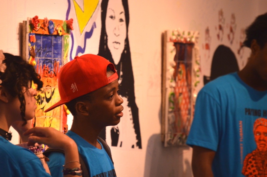 Amie Mulungula. His hero, Jay Kemp, is pictured behind him. Karen Marks Photo.