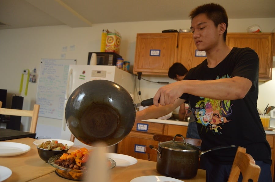  Kevin Zhen sets the table for Homecooked. Karen Marks Photos.  