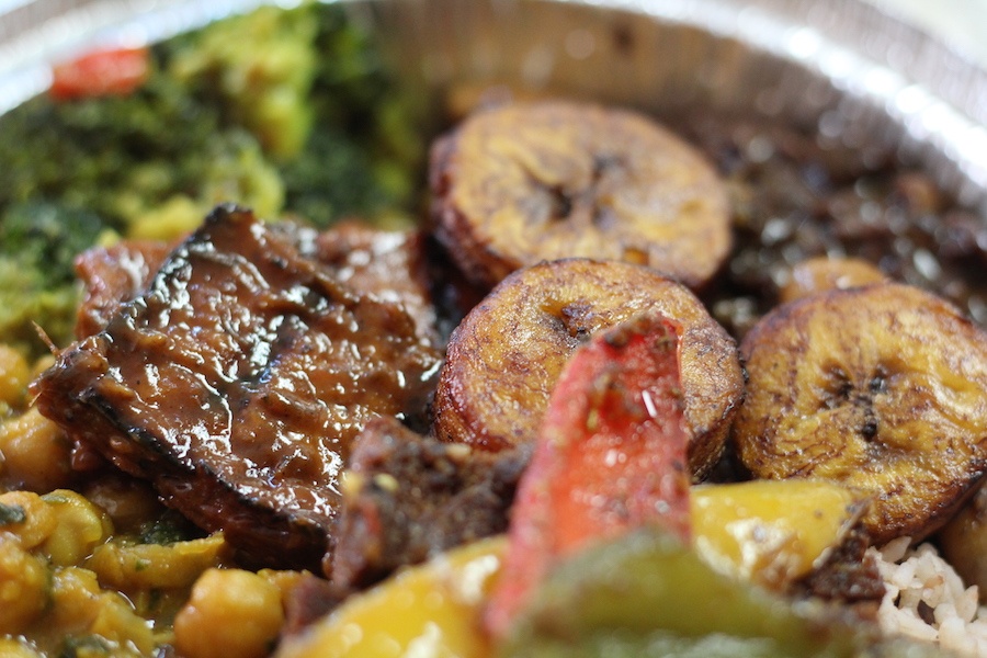 Two beef patties, oxtails, rice and peas and cabbage. That’s my standard order when I walk up to the counter at a Jamaican spot. Lucy Gellman Photos.