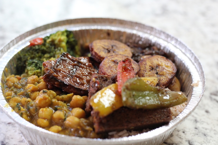  One veggie patty, curried vegetables, nine bean stew, green beans, curried chick peas and rice was all it took to make this oxtail lover forget meat entirely. 