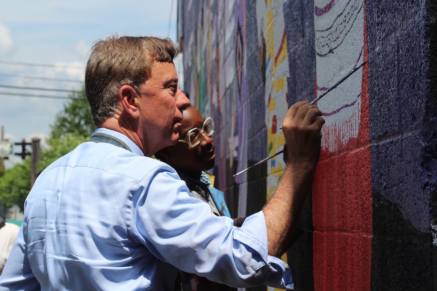 Lamont at the mural.