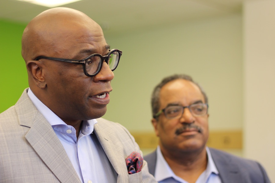 President and CEO Erik Clemons, with Bill McCraven in the back.