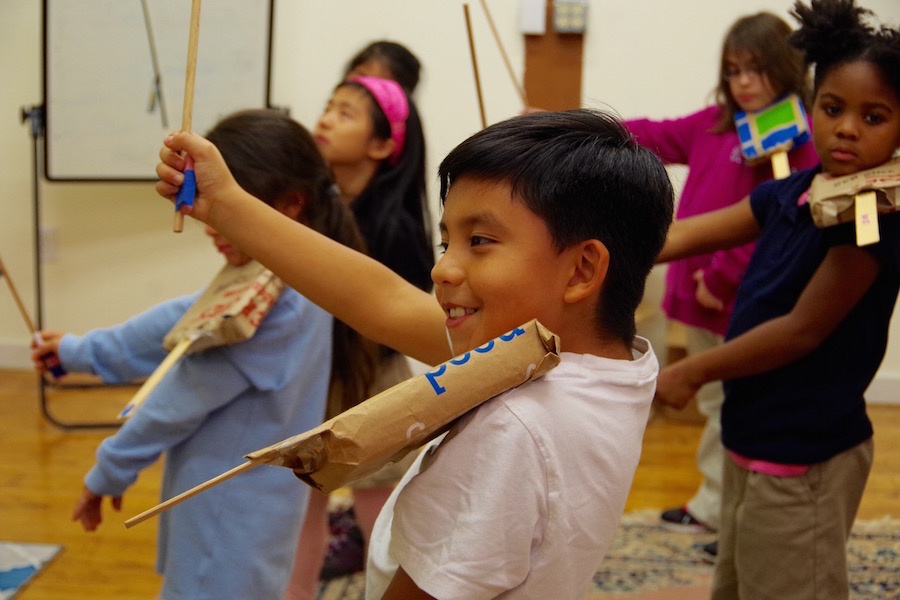 Students at Music Haven, one of the grant recipients, practice on their box violins in fall 2017. The organization received $25,000 for programming for the next fiscal year.  Lucy Gellman File Photo.