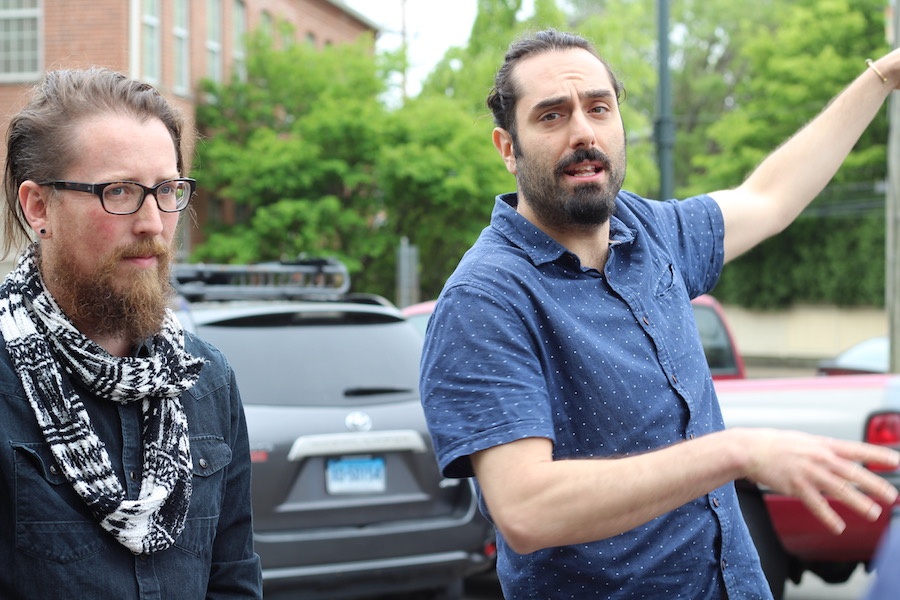  Lotta Studio Co-Founder Luke Hanscom and Filmmaker Travis Carbonella by Westville's long mural in the Whalley/Blake Public Parking Lot.   