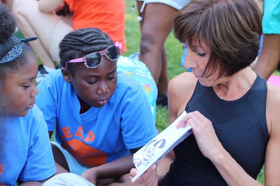 Christine Atkins with LEAPers Chaima Arouna and another camper.
