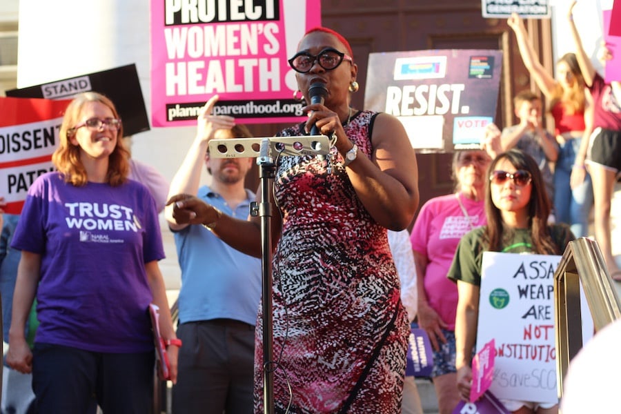  State Rep. Robyn Porter was one in a packed lineup of speakers to speak at a #SaveSCOTUS rally Tuesday evening. She challenged those at the rally not just to call their legislators, but to reach out to family members and friends in other states and urge them to call their legislators as well.  Lucy Gellman Photos. 