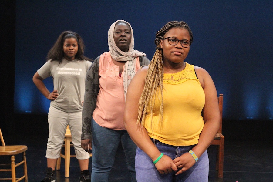Mariame Kazadi, Azhar Ahmed, and Drysile Kazadi at the beginning of the show.