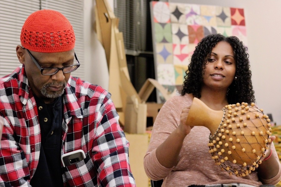 Smith and Marcano. The drum Marcano is holding is the shekere.