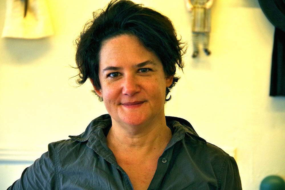  Lewis during the final stages of the install. Lucy Gellman photo.&nbsp; 