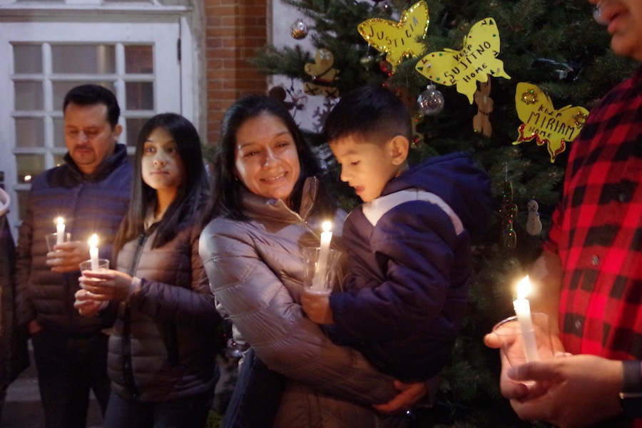  Pinos' wife, holding their son Brandon: Thank you so much. Kelly and Nelson Pinos pictured in back. Lucy Gellman Photo.  