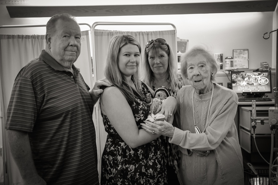  Ashley Brandl with her family and Zane in the NICU. JoAnn Marrero photo.   