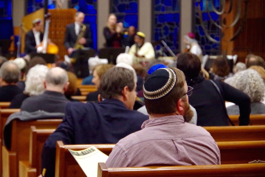 As the 7:30 p.m. service drew near, the pews filled with attendees from Jewish, Muslim, Bahai, Buddhist, and Christian Backgrounds. Lucy Gellman Photo.