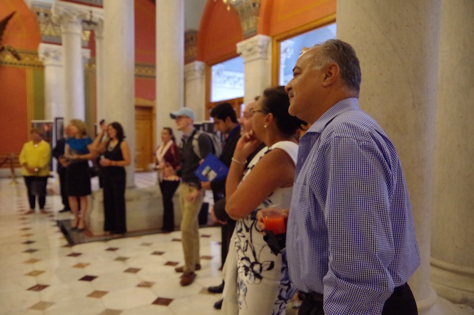  Couple Ruben and Nancy Serrano lean in for remarks.  