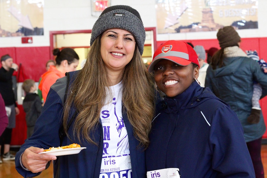 Gladys Mwilelo (right), with New Havener and fellow refugee Bushra Madhi.