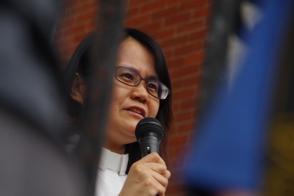  Pastor Juhye Hahn at Sunday night's prayer vigil for Marco Antonio Reyes Alvarez. Lucy Gellman photo.&nbsp; 