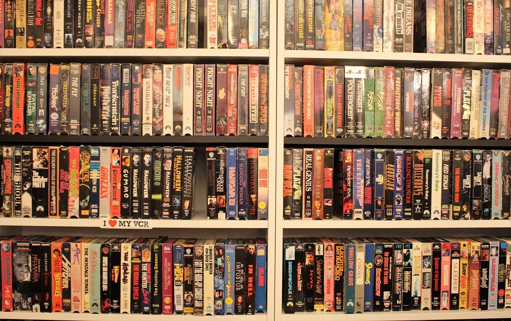The VHS shelf in the back room of The Archive.