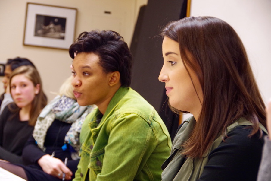  Treneé McGee (in the green) sculpts her feedback for the students.  